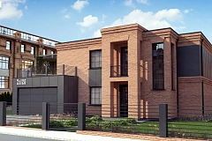 Современный двухэтажный дом с облицовкой фасада из кирпича