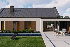 Одноэтажный дом с двускатной крышей и гаражом на одну машину.