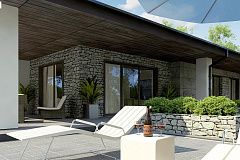 Одноэтажный дом с каменной облицовкой фасадов