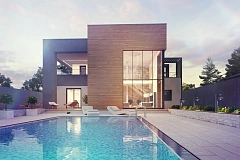 Современный двухэтажный дом с большой площадью остекления.