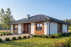 Лаконичный одноэтажный коттедж с четырьмя спальнями.
