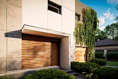 Современный двухэтажный дом с плоской кровлей и большим остеклением.